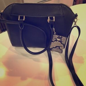 NWOT Versatile never used stylish Black Purse